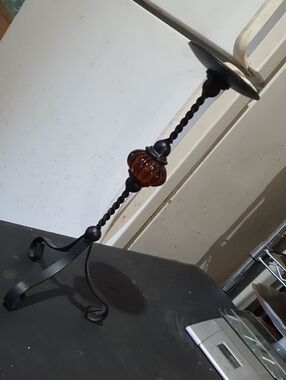 Decorative Twisted Metal Candle Holder with Amber Glass Accent